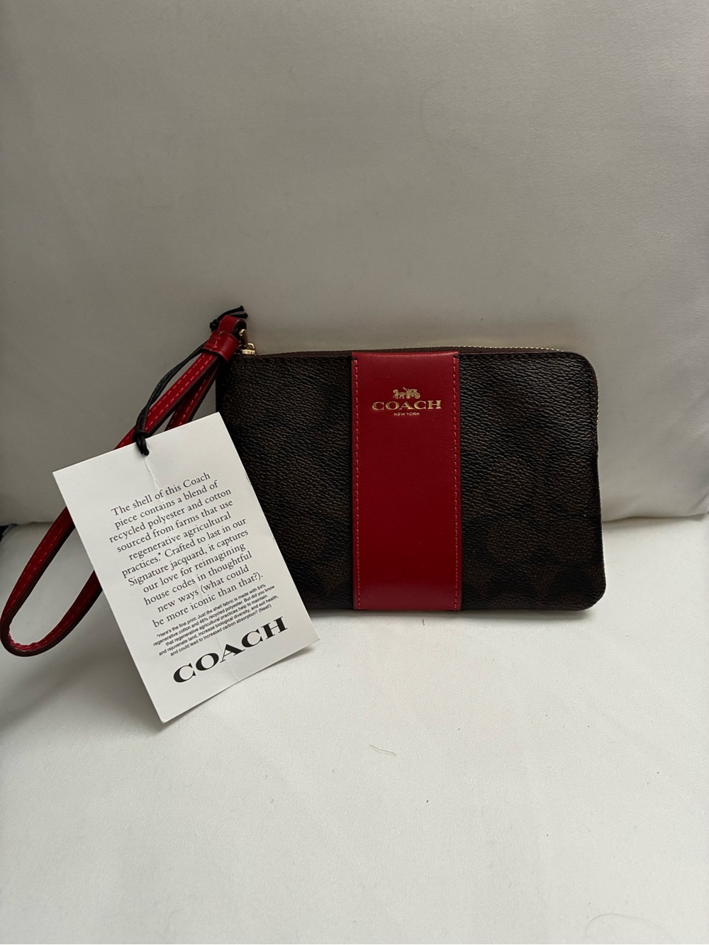 Coach Brown Coated Canvas Wristlet with Red Center Stripe